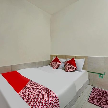 Oyo 90158 Hotel Lendosis Perintis Kemerdekaan Palimbão Exterior foto